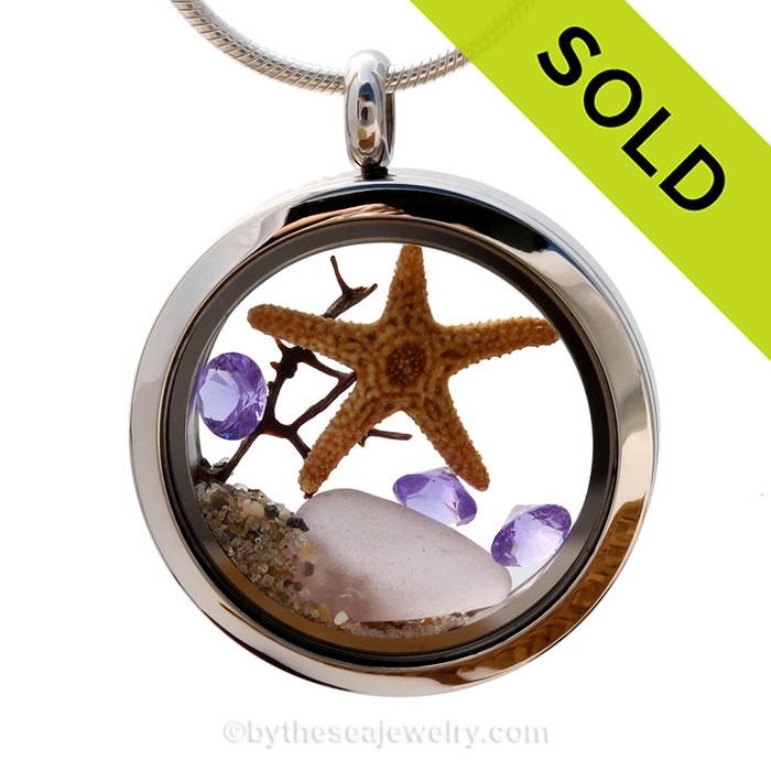 Stunning early 20th century purple or lavender sea glass combined with beach sand, a bit of sea fan and brightened up with amethyst gems makes this a great choice for a February Birthday.
Sorry this Sea Glass Jewelry selection has been SOLD!