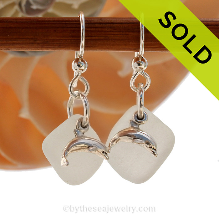 Airy and light pure White Sea glass Earrings in sterling with sterling Dolphin charms!
SOLD - Sorry these Sea Glass Earrings are NO LONGER AVAILABLE!