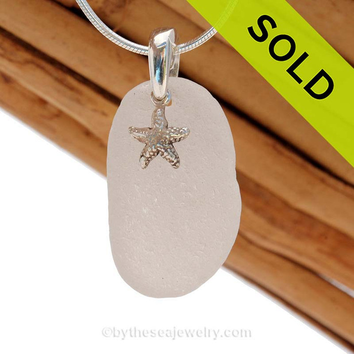Common but Perfect Larger White sea glass necklace set on a solid sterling cast bail with a sterling silver Starfish charm.
SOLD - Sorry this Sea Glass Jewelry selection is NO LONGER AVAILABLE!