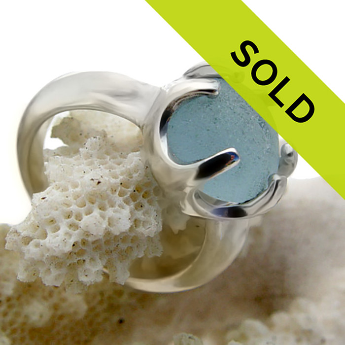 A great natural piece of genuine sea glass in a bright blue hue on a solid sterling 6 prong ring setting.
Sorry this piece of Seaham English sea glass jewelry is no longer available.