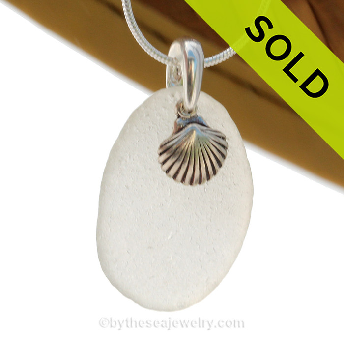 Pure white Genuine Sea Glass Necklace With Sterling Silver Sea Shell Charm - 18" STERLING CHAIN INCLUDED.
SOLD - Sorry this Sea Glass Necklace is NO LONGER AVAILABLE!