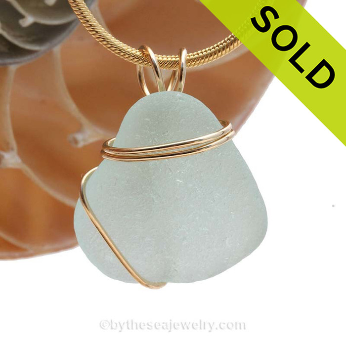 A perfect thick piece of vivid sea water green beach found sea glass in a wire wrapped necklace pendant.
SOLD - Sorry this Sea Glass Pendant is NO LONGER AVAILABLE!