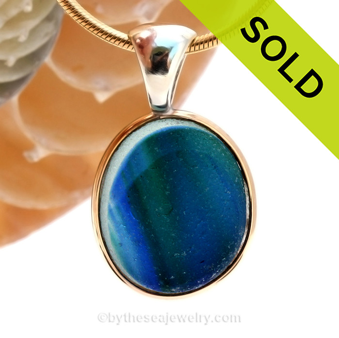 This amazing Water colors multi sea glass piece is versatile in a mixed metal Deluxe Wire Bezel© pendant setting.
SOLD - Sorry this Ultra Rare Sea Glass Pendant is NO LONGER AVAILABLE!