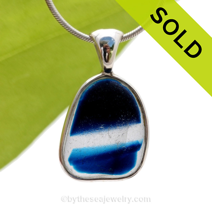 A Lovely Medium Sized Mixed Blue Seaham multi sea glass set in Sold Sterling Silver Deluxe Wire Bezel© pendant setting.
SOLD - Sorry this Rare Sea Glass Pendant is NO LONGER AVAILABLE