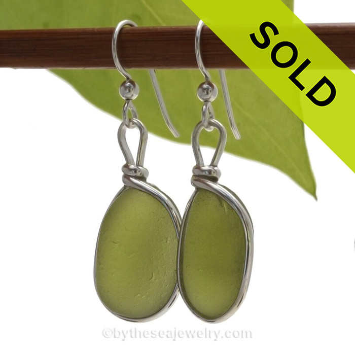 Genuine thick and vivid Peridot Green English Sea Glass Earrings in our Original Wire Bezel is Solid Sterling Silver.