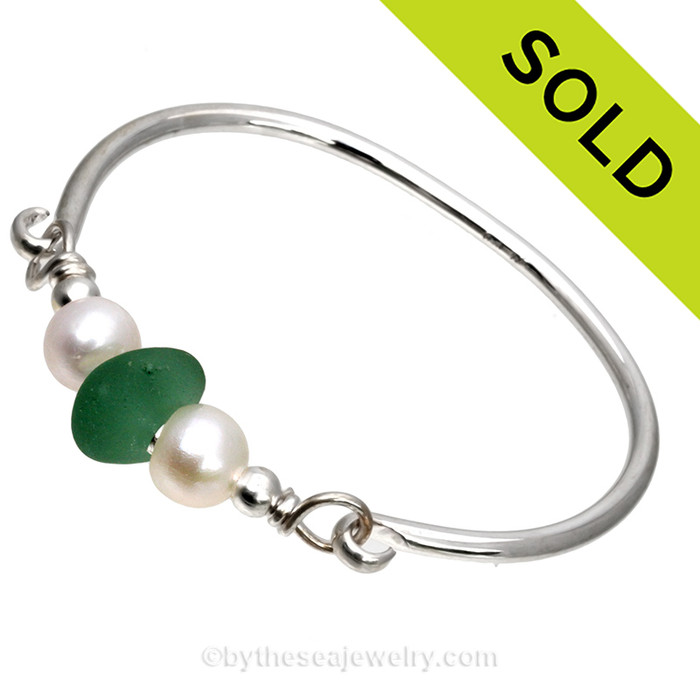 Perfect Aqua Green English Sea Glass combined with real cultured pearls on this Solid Sterling Silver Full round Sea Glass Bangle Bracelet.