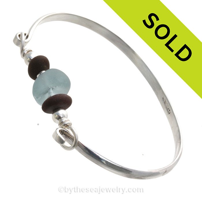 Unusual Gray Blue Genuine English Sea Glass & Natural Beach Stones on this Solid Sterling Silver Half Round Sea Glass Bangle Bracelet. This is finished in solid sterling beads.
SOLD - Sorry this Sea Glass Bangle Bracelet is NO LONGER AVAILABLE!