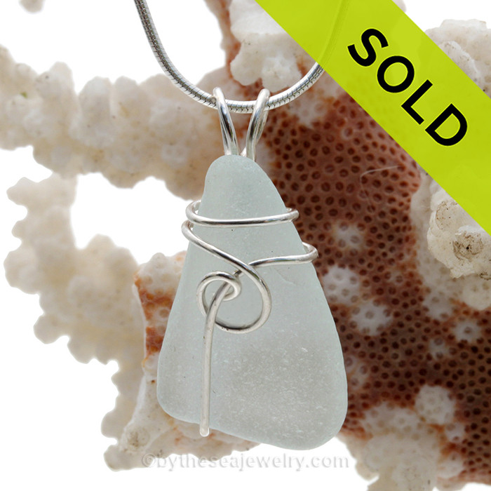 A perfect piece of genuine Sea Glass Pendant in bright white and Our simple secure wire wrapped Sea Swirl sterling setting. Simple and affordable!
SOLD - Sorry this Sea Glass Pendant is NO LONGER AVAILABLE!