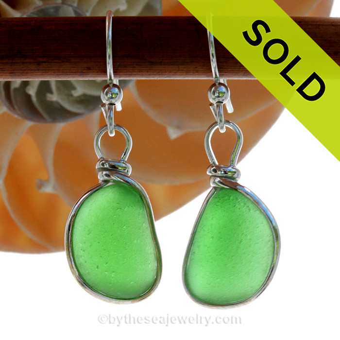 Long and lovely vivid green beach found Sea Glass Earrings set in our signature Original Wire Bezel© setting in silver.
SOLD - Sorry these Sea Glass Earrings are NO LONGER AVAILABLE!