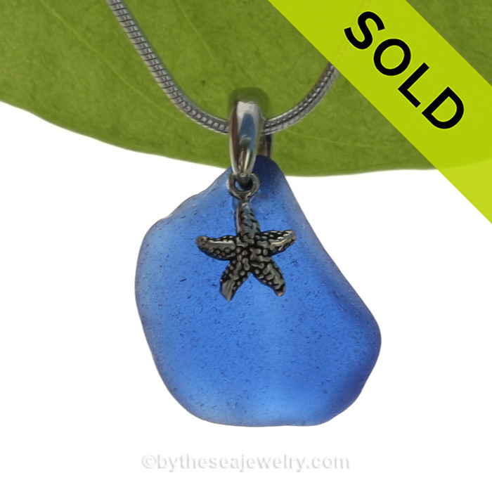 A curvy Rare Cobalt Blue beach found Sea Glass Necklace set on a Solid Sterling cast bail with a sterling silver Starfish Charm.
SOLD - Sorry this Sea Glass Necklace is NO LONGER AVAILABLE!