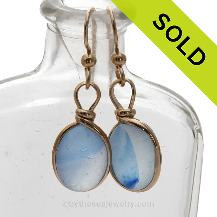 Cross Sectioned Petite Light and Dark Blue Sea Glass Earrings set in our Original Wire Bezel© setting In 14K Goldfilled.
SOLD - Sorry these Ultra Rare Sea Glass Earrings are NO LONGER AVAILABLE!