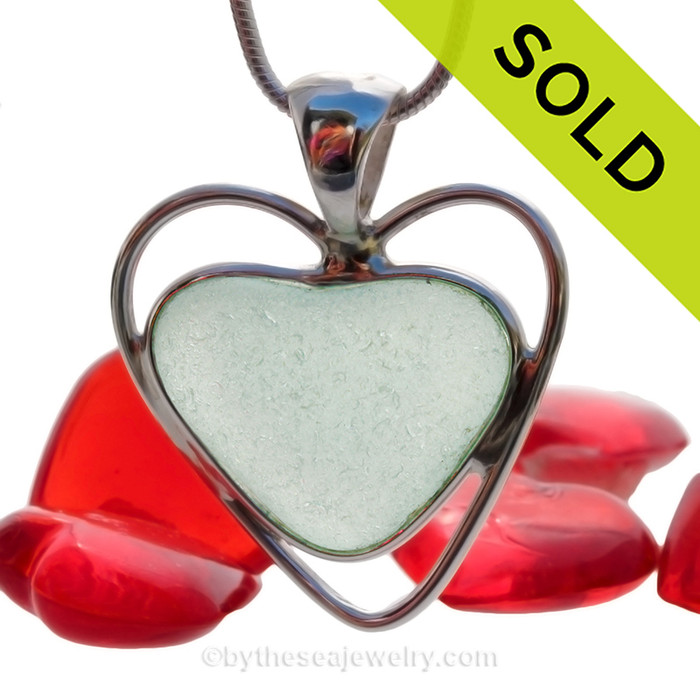 A beautiful and mid rare Seafoam Green  natural sea glass heart set in our deluxe wire bezel pendant setting! 
Genuine sea glass hearts are a RARE phenomena and cherished among sea glass lovers!
SOLD - Sorry this Sea Glass Necklace is NO LONGER AVAILABLE!