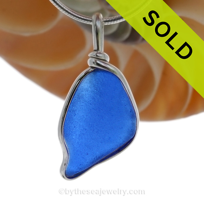 A nice naturally shaped blue sea glass pendant in our Original Wire Bezel setting.
SOLD - Sorry this Rare Sea Glass Pendant is NO LONGER AVAILABLE!