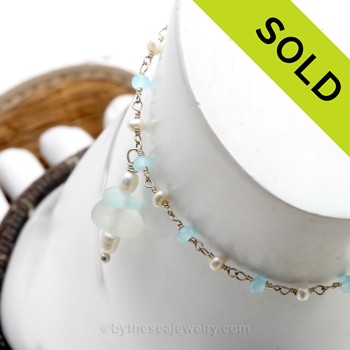 Solid Sterling Simple Pure White and a Love Pale Aqua Sea Glass Ankle Bracelet With Pearls and Aquamarine Delicate Chain
Handcrafted Solid Sterling on a pearl and aquamarine sterling chain.
SOLD - Sorry this Sea Glass Ankle Bracelet is NO LONGER AVAILABLE