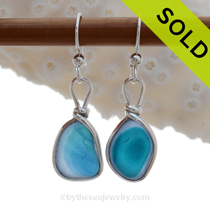 An AWESOME STUNNING match in my English Multi Sea Glass Earrings in a Bright Electric Aqua Blue In Aqua set in our Original Wire Bezel© setting in Solid Sterling Silver.
ULTRA RARE - This is EXCEPTIONALLY hard glass to match to this degree!
Our Original Wire Bezel© setting lets all the beauty of these beauties shine!