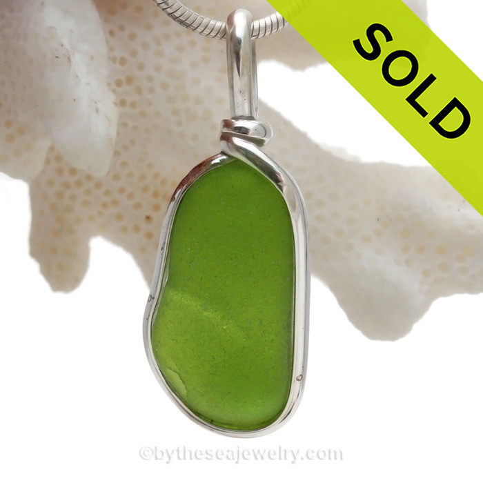 A Long and vivid Chartreuse or Electric Lime Green sea glass piece set in our Original Wire Bezel© setting.