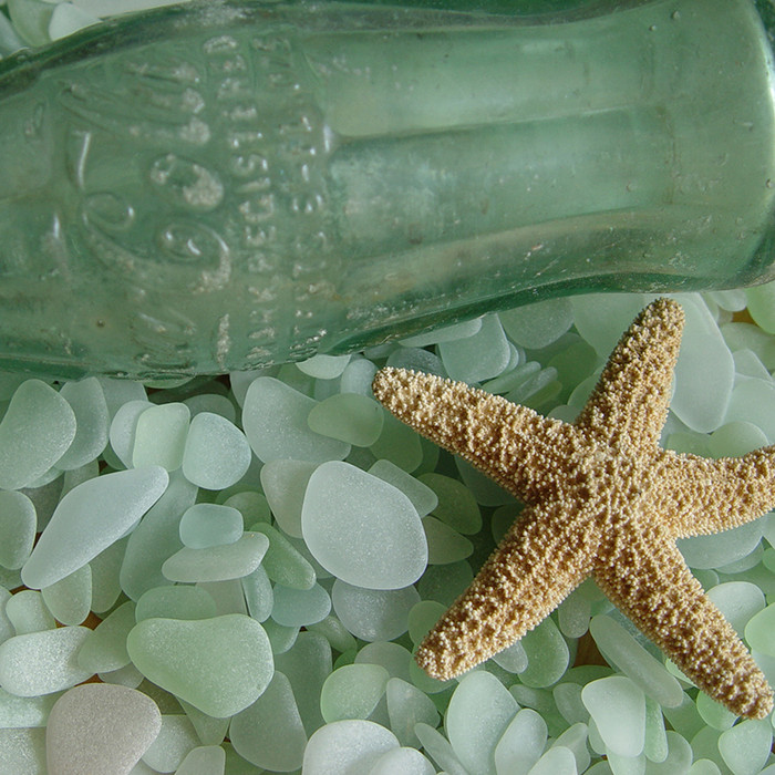 Many green sea glass pieces started out as Coke A Cola bottles tossed into the sea.