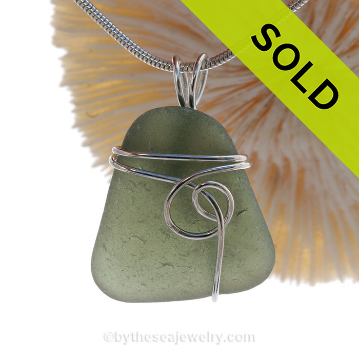 This natural sea glass piece is natural Seaweed Sea Green Genuine Sea Glass In Sterling Sea Swirl Setting Pendant for Necklace.