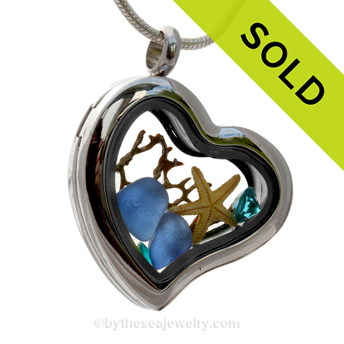 Beautiful pieces cobalt blue and aqua sea glass pieces combined with a real starfish and a premium Turquoise Gems in this Genuine Sea Glass Heart Locket Necklace.