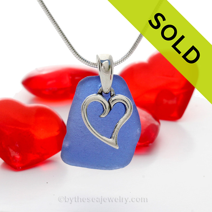 Genuine Cobalt Blue sea glass set on a Solid Sterling Cast bail with a Sterling Silver Heart Charm -  18" Quality Chain INCLUDED