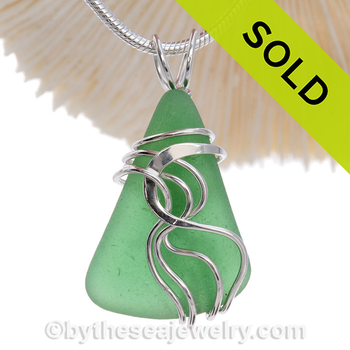 Green Genuine Sea Glass Sterling Waves© Signature Sterling Setting Pendant.
This perfect natural beach found sea glass in our WAVES sterling necklace pendant setting that maximizes the bling of silver yet leaves most of the sea glass open and UNALTERED from the way it was collected on the beach.
