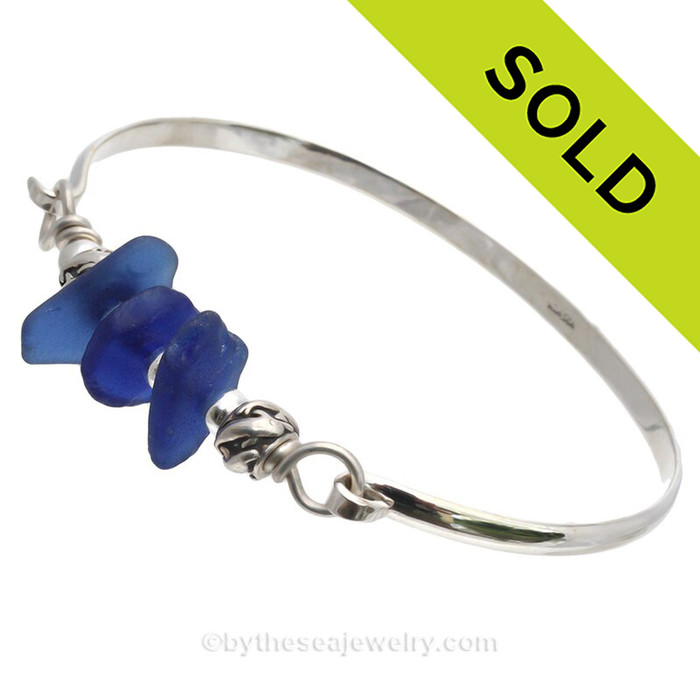 Lucky Cobalt and Medium Blue Sea Glass combined Solid Sterling Beads on this Solid Sterling Silver Premium Sea Glass Bangle Bracelet.