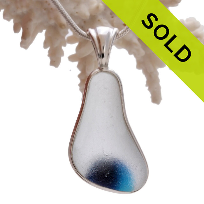 An amazing Royal Blue in a pure white base. This piece was once the tip of a punty or pontil rod used to gather and work glass in the kiln. The color being worked was the rich blue at the bottom.