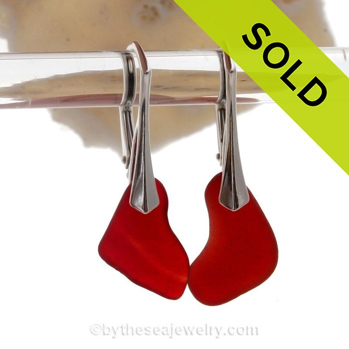 Cool Organic shaped Ruby Red Natural Sea Glass pieces really glow hanging from these solid sterling silver leverback earrings.