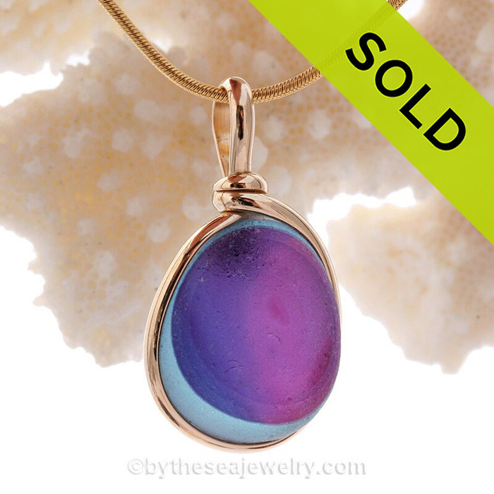 This is a the stunning piece of Hot Pink, Mid Blue and Purple Genuine Sea Glass set in our Original Wire bezel© setting in 14K Rolled Gold. 