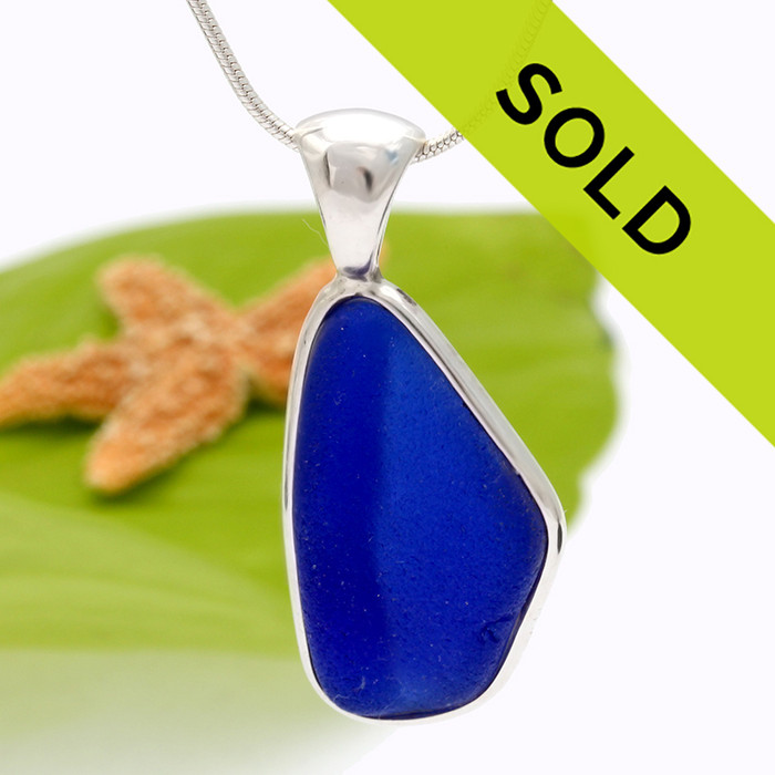 This vivid ridged blue sea glass pendant has been sold!