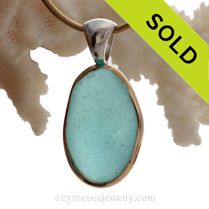Very Large Chunky Aqua Blue Genuine Sea Glass set in our Mixed Deluxe Tiffany Wire Bezel© pendant setting .
