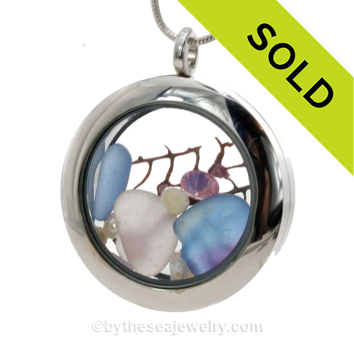 Mixed Pink & Blue Seaham Multi and white blue Genuine Sea Glass combined with Pearls and a bit of pink bling. Finished with Beach sand makes this your own personal beach on the go!