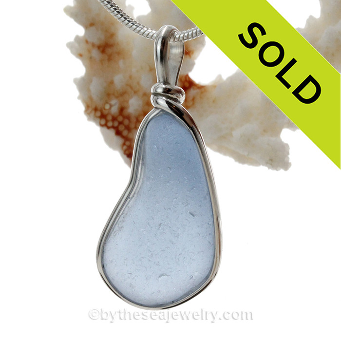 This piece features the glass and beauty of the collected seafoam sea glass and is presented on a professionally our Original Wire Bezel Setting© that leaves the sea glass UNALTERED from the way it was found on the beach. 