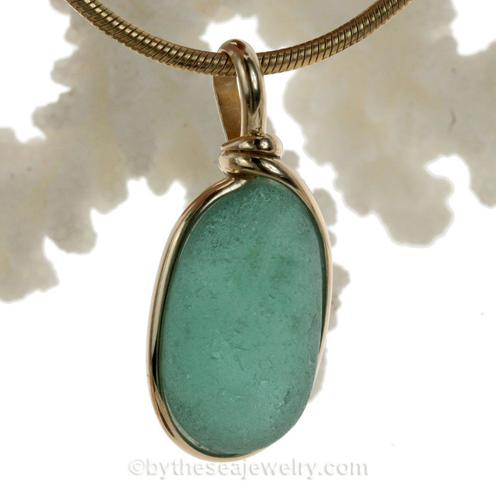 A nice piece of vivid aqua with in our signature Original Wire Bezel© pendant setting that leaves both front and back open and the glass unaltered from the way it was found on the beach.