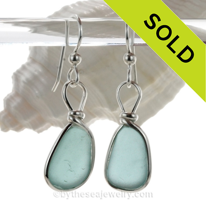Genuine naturally collected Aqua Blue sea glass from Hawaii in our ORIGINAL Wire Bezel© setting in Silver.