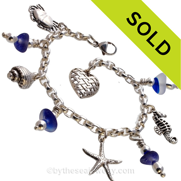 Nothing like this on the market - A Beautiful Sea Glass Charm Bracelet with all Heavy Sterling soldered links and Mixed Blue English Sea Glass & Solid Sterling Charms
SOLD - Sorry this Sea Glass Jewelry selection is NO LONGER AVAILABLE!