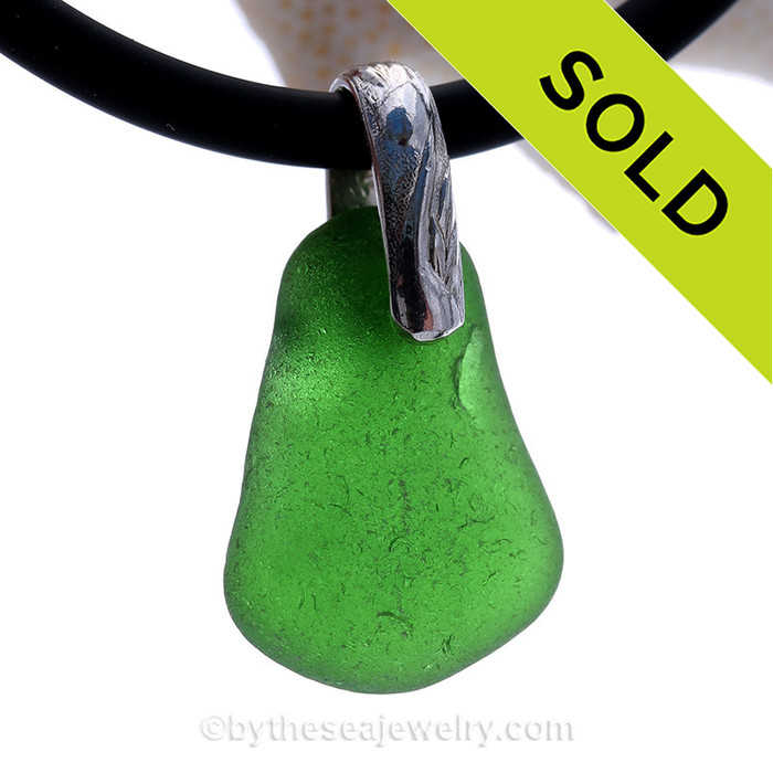 Perfect Large Well Aged Vivid Green Sea Glass Necklace on Custom Crafted Solid Sterling Bail. Comes with a thick 4MM Neoprene Cord with Sterling Clasps