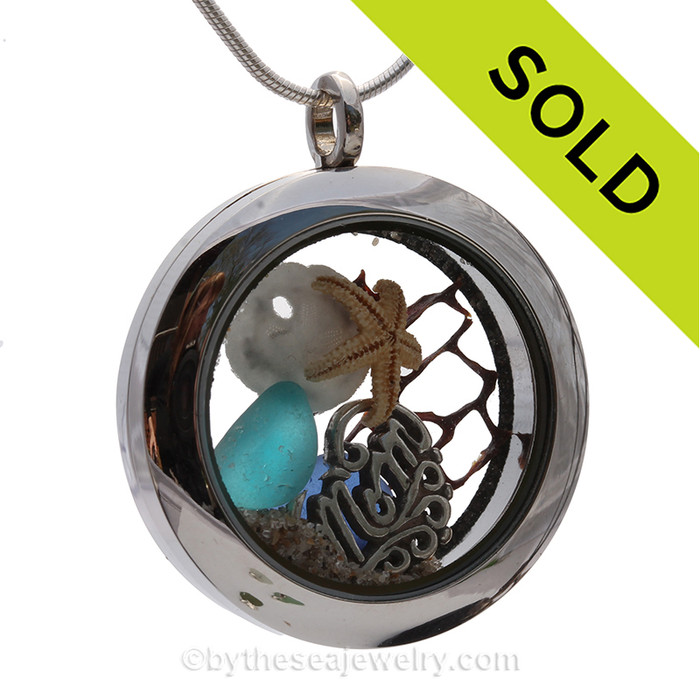 Genuine Electric Aqua Sea Glass with Sandollar, Starfish and Sterling Mom Charm Locket Necklace.
SOLD - Sorry this Sea Glass Jewelry selection is NO LONGER AVAILABLE!