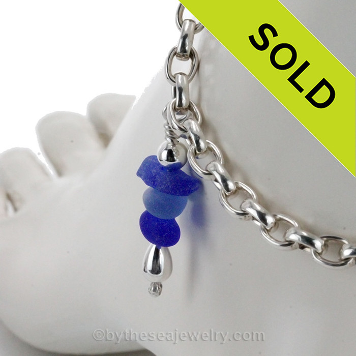 A sturdy heavy duty solid sterling silver anklet with genuine cobalt blue and perwinkle blue sea glass dangle.