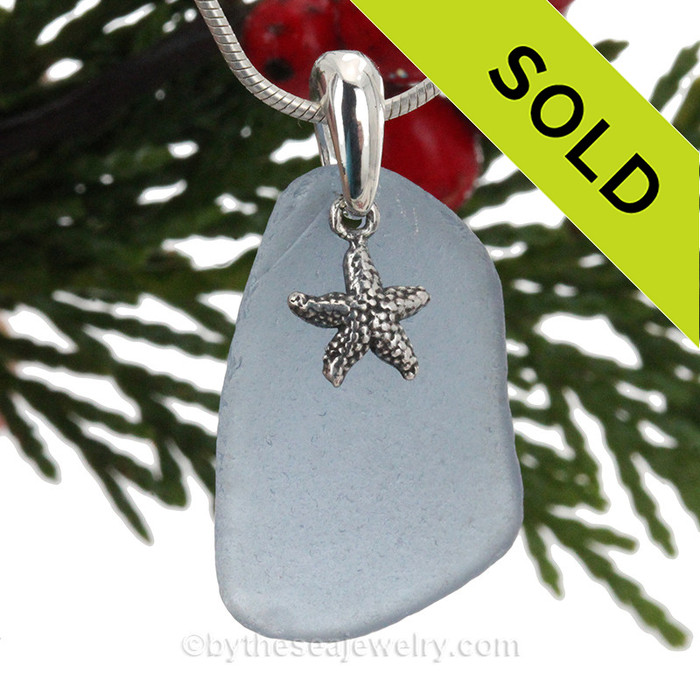 Carolina or Periwinkle Blue sea glass is combined with a solid sterling starfish and presented on an 18 Inch solid sterling snake necklace chain.