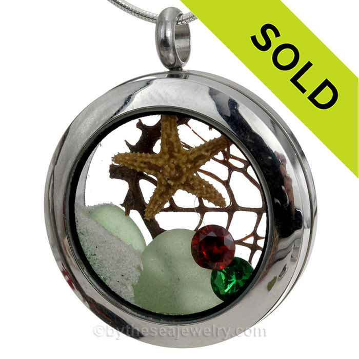 Green sea glass and a real starfish make this a great locket necklace for the holidays.