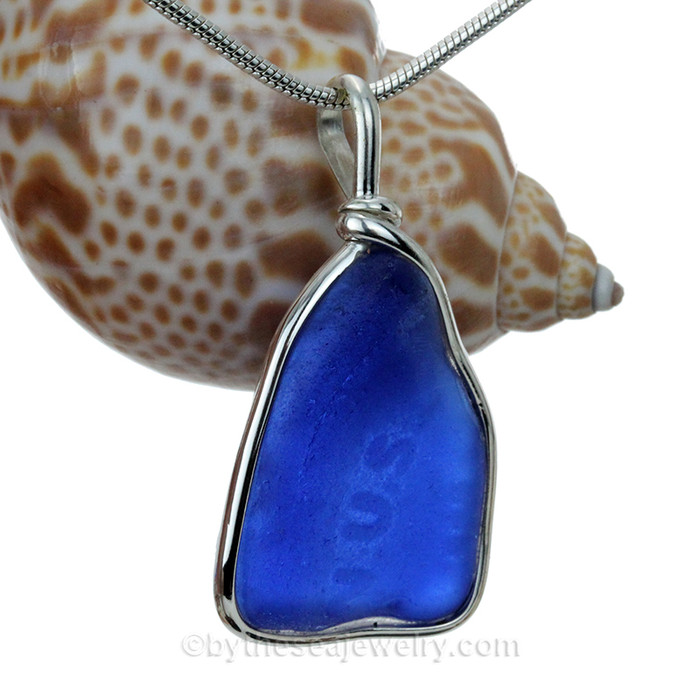 A LARGE and UNIQUE piece of Embossed Cobalt Blue Genuine Sea Glass with in our signature Original Wire Bezel© pendant setting in Sterling Silver.