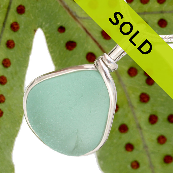 Sorry this vivid aqua sea glass pendant has been sold!