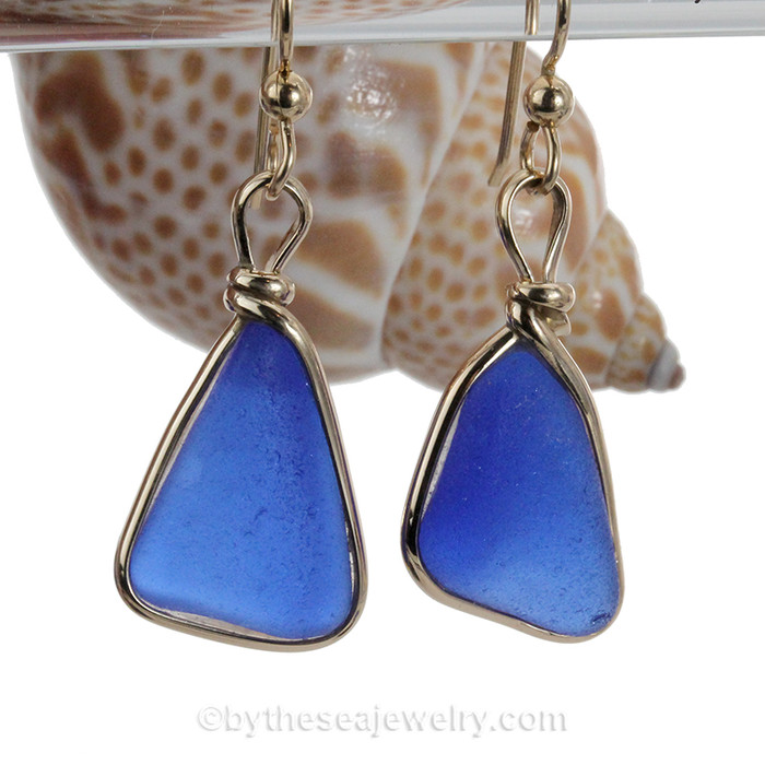 blue sea glass set in our Original Wire Bezel earring setting in gold