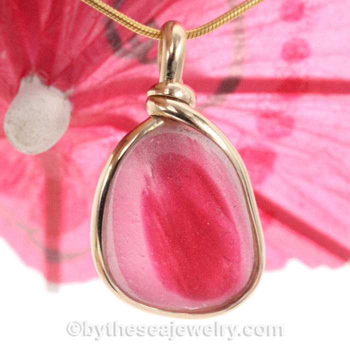 A mixed vivid tourmaline pink color on this English Sea Glass Pendant set in our Original Wire Bezel© necklace pendant setting in 14K Rolled Gold.