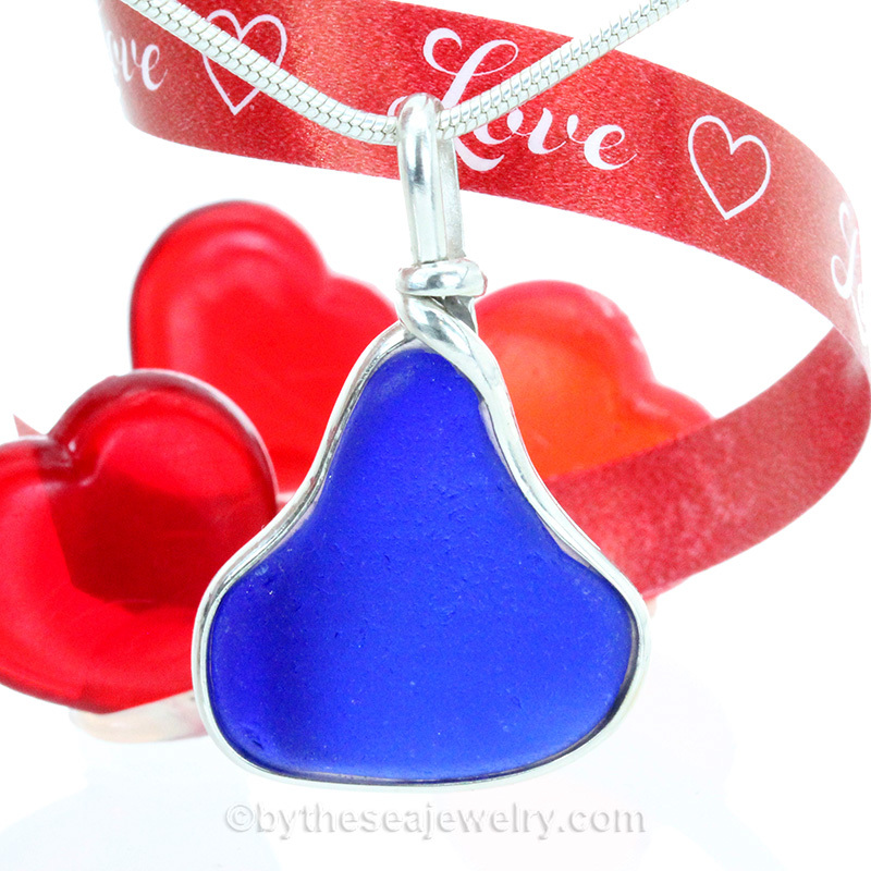 blue sea glass pendant in tiffany deluxe (gold and silver) bezel setting