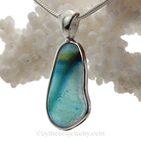 mixed color sea glass pendant in sterling bezel