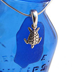 blue sea glass necklace with turtle charm