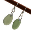 A perfect match of beach found UNALTERED sea glass set on fishook earwires.
A lovely pair of earrings for any time of year!
