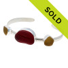 A custom made fine sea glass bracelet using our sea glass in customer preferred colors of red and golden yellow
